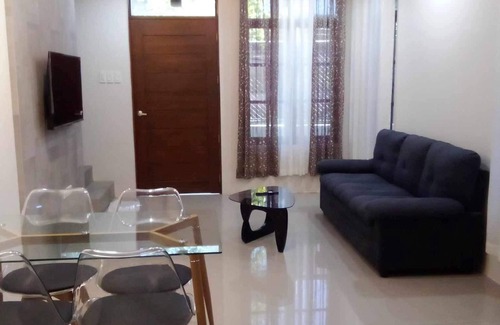 Cogon House | Cozy 3-bedroom condo with WiFi and fitness room in cool Tagbilaran City.