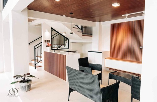Cogon House | Cozy 3-bedroom condo with WiFi and fitness room in cool Tagbilaran City.