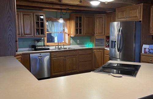 Black River Falls House | Cozy 3 story Log Cabin with space for the entire family and an amazing view