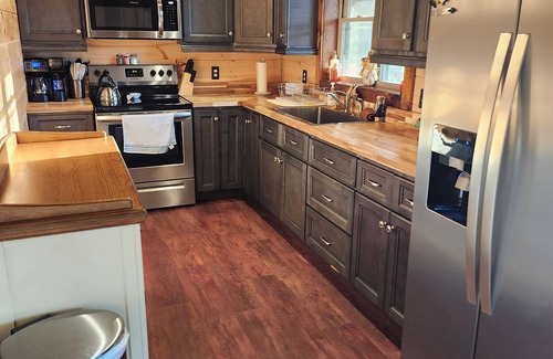 Lewisburg Cabin | Cozy 4-bedroom cabin with a private lake. Pet Friendly.