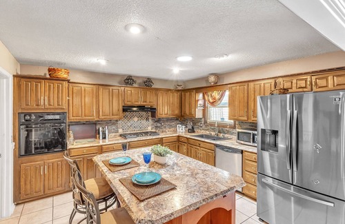 Tulsa House | Cozy 4 Bedroom Home - Minutes to Downtown Tulsa by RedAwning