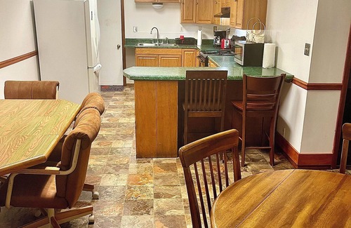 Kistler House | Cozy 4-bedroom house in Man w WiFi, arcade game, and extra parking. Near trails.