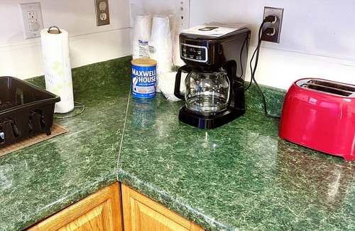 Kistler House | Cozy 4-bedroom house in Man w WiFi, arcade game, and extra parking. Near trails.