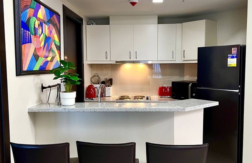 Pinagsama Condo | Cozy and Modern 2 Bedrooms + Maid’s Room| Bathtub | 600 Mbps