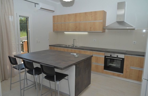Potamos Apartment | Cozy and Modern Home near Corfu town w/WiFi and Garden Perfect for Families.