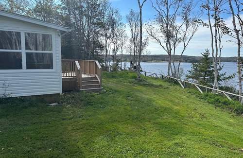 Albert Bridge Cottage | Cozy and Quiet Cottage on Mira River. Close to Sydney and Fortress Louisbourg.