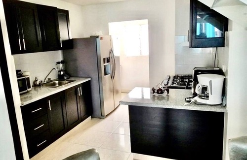 Licey al Medio Apartment | Cozy apartment, 24/7 security, Airport 8 minutes.