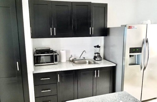 Licey al Medio Apartment | Cozy apartment, 24/7 security, Airport 8 minutes.