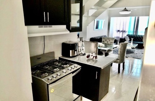 Licey al Medio Apartment | Cozy apartment, 24/7 security, Airport 8 minutes.