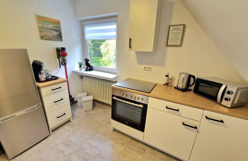 Wardenburg Condo | Cozy apartment right on the coastal canal!