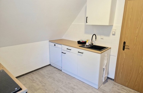 Wardenburg Condo | Cozy apartment right on the coastal canal!