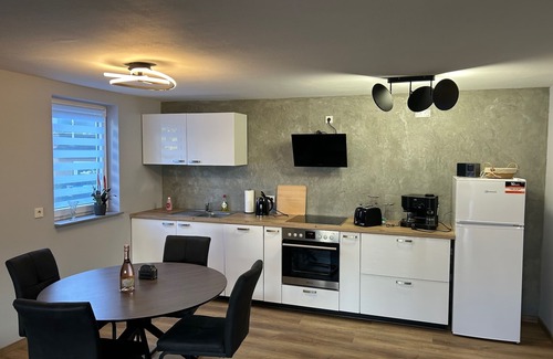 Heusweiler Apartment | Cozy apartment with terrace and garden view