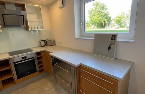 Wernberg-Koeblitz Apartment | Cozy basement apartment with spacious living room and green outdoor area