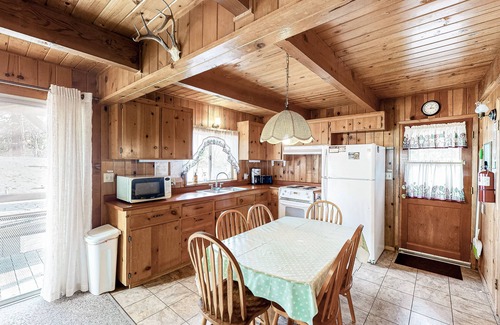 Bass Lake Cabin | Cozy Bass Lake home in Willow Cove with fireplace, grill & deck
