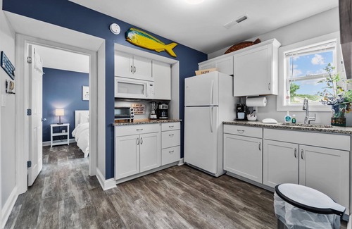 Colington Apartment | Cozy beach get away situated between the ocean and sound. Pet friendly!