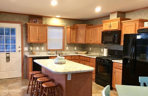 Maple Lake House | Cozy Beach Getaway with Private Sandy Beach & Dock, 2 Paddle Boards, & 2 Kayaks