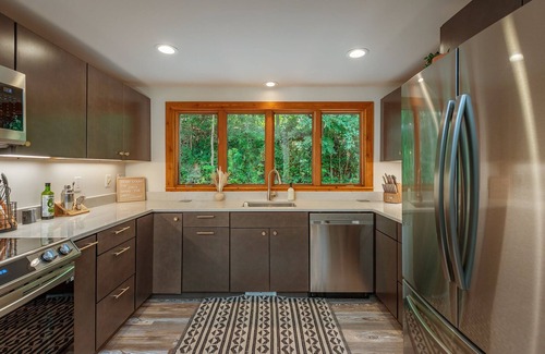 Canton Cabin | Cozy Boho Log Cabin 20 mins to AVL with Hot tub-Game room-Creek-Firepit-Hammock