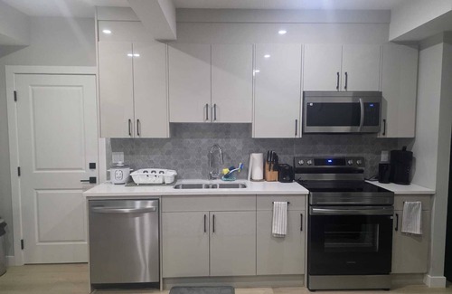 Calgary Apartment | COZY BRAND NEW LEGAL SUITE AT LIVINGSTON CALGARY - 10MINS TO THE AIRPORT