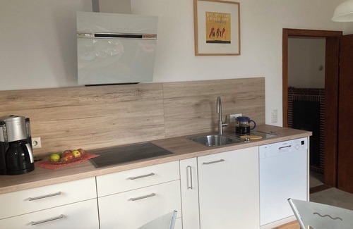 Hessisch Oldendorf House | Cozy, bright vacation home with beautiful views, sunny balcony, tiled stove