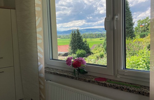 Hessisch Oldendorf House | Cozy, bright vacation home with beautiful views, sunny balcony, tiled stove