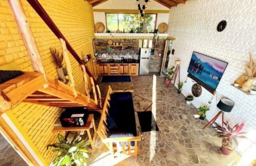 Almora House | Cozy bungalow nestled in the Himalayas, snow-capped peaks, Kumaoni culture.