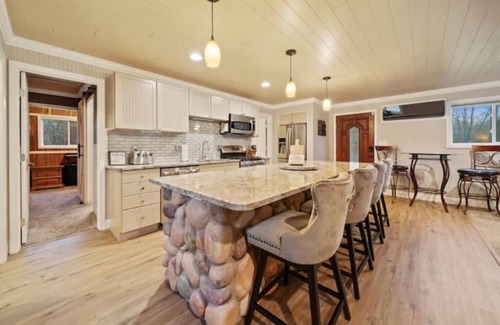 Mancelona House | Cozy Cabin and Spacious Party Barn in Beautiful Northern Michigan