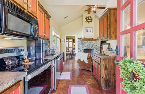 Okmulgee County Cabin | Cozy Cabin in the Country with resort style pool! Secluded, Slide and Waterfall