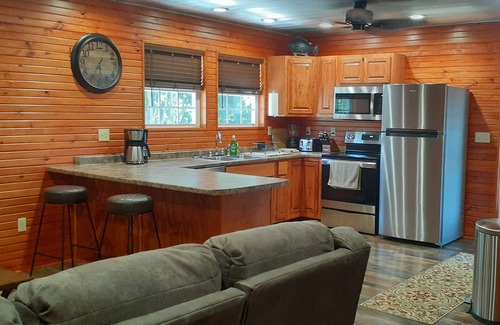 Monticello Cottage | Cozy cabin minutes from Lake Cumberland with room for your boat.