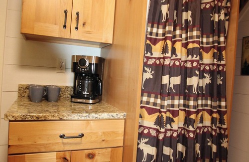 Wellington Cabin | Cozy cabin nestled in the woods with a beautiful view