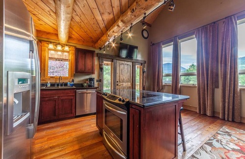 Coram Cabin | Cozy cabin outside Glacier National Park. Private hot tub + pet-friendly!