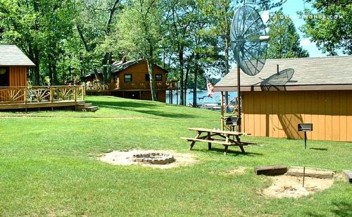 West Branch House | Cozy Cabin Rental with Stunning Lake Views in West Branch, Michigan