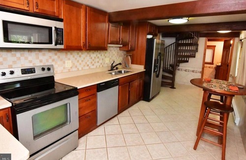 Berryville House | Cozy cabin right on the Shenandoah River. Kayak and tube your way to relaxation.