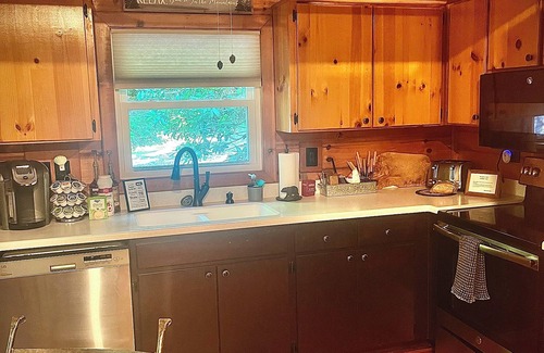 Blairsville Cabin | Cozy cabin sitting directly on multiple creeks for the most relaxing stay.