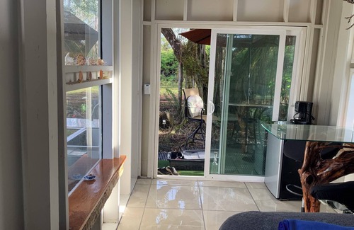 Eden Roc Cabin | Cozy cabin under majestic banyan tree