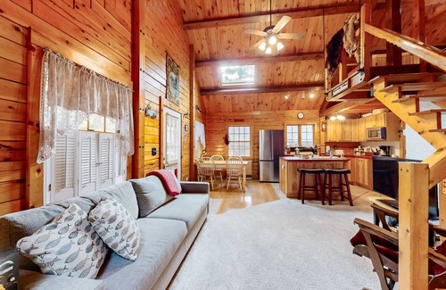 Beaver Cove House | Cozy cabin with covered porch, firepit, grill, fireplace, & washer/dryer