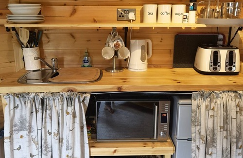 Pentre Berw Cabin | Cozy Cabin with Hot Tub Retreat in Anglesey