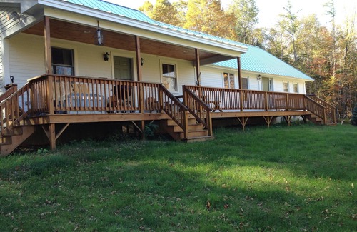 Kingfield Cabin | Cozy Camp Nestled In The Woods by the Carrabassett River, on 20 acres .