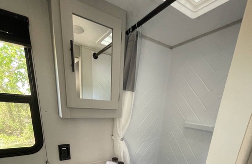 Abercrombie House | Cozy camper with full hookups, free parking, and free Wifi!