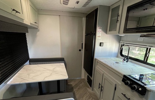 Abercrombie House | Cozy camper with full hookups, free parking, and free Wifi!