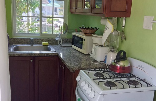 Stewart Town Apartment | Cozy Caribbean Paradise Getaway with Pool. Come for the Sea, Sand and Sun