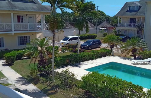 Stewart Town Apartment | Cozy Caribbean Paradise Getaway with Pool. Come for the Sea, Sand and Sun