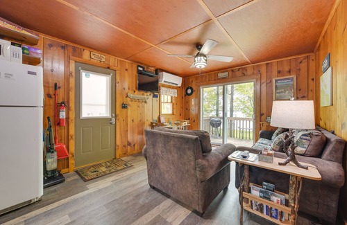 Carp Lake Cottage | Cozy Carp Lake Cottage w/Dock, Kayaks & Fire Pit
