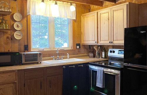 Carrabassett Valley Cabin | Cozy Carrabassett Cabin - less than 2 miles to Sugarloaf Mountain!