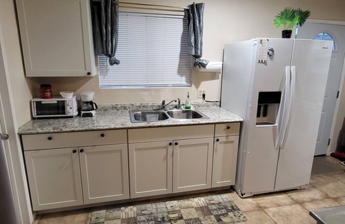Youngtown Apartment | Cozy Casita in a safe quiet neighborhood near a beautiful pond.