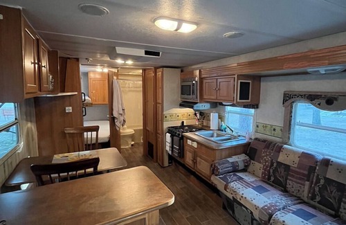 Higgins Lake House | Cozy Charm on Wheels. Remodeled Camper.