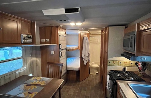 Higgins Lake House | Cozy Charm on Wheels. Remodeled Camper.