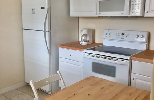 Pine Island Center House | Cozy, clean duplex with outdoor dinning.