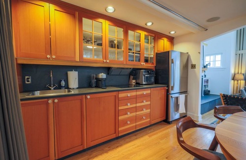 Mount Royal Cottage | Cozy Cliff Bungalow Cottage: Inner City Oasis with Home Theater and Parking!