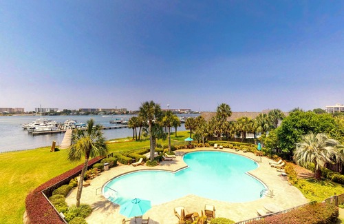 Fort Walton Beach Apartment | Cozy coastal efficiency with kitchenette, balcony with sound views & pool