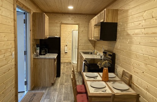 Woden Cabin | Cozy container cabin nestled in the Angelina National Forrest!